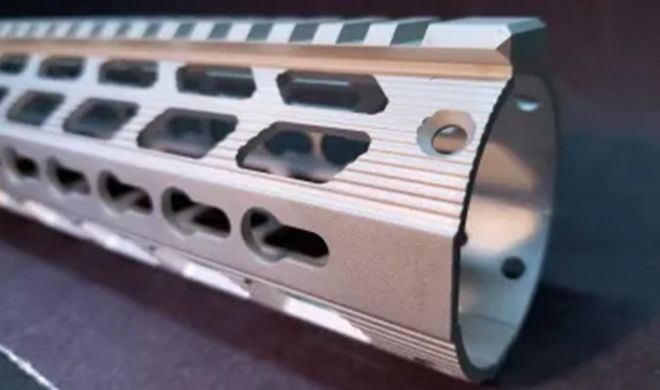 A close-up of an aluminum firearm part.