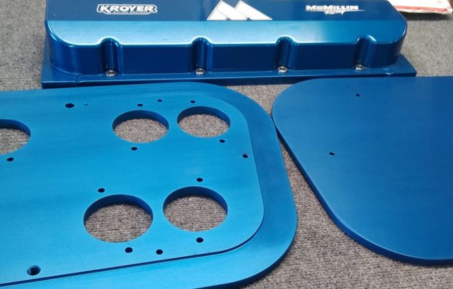 Color anodized aluminum parts, featuring a blue dyed finish.